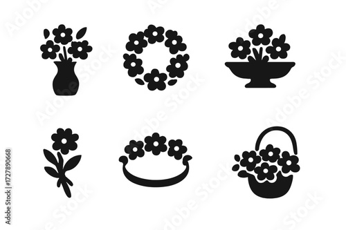 Floral Icon Set. Solid, filled icon set of flower arrangements: vase arrangement, wreath, centerpiece, corsage, boutonniere, floral crown, garland, hanging