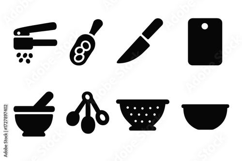Garlic and Beans Tools. Solid, filled icon set of garlic and beans kitchen tools: garlic press, bean scoop, knife, cutting board, mortar and pestle, measuring