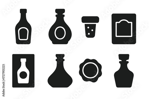 Brandy Icons Collection. Solid, filled icon set of brandy bottles and packaging: classic brandy bottle, snifter bottle, cork stopper, label design, boxed