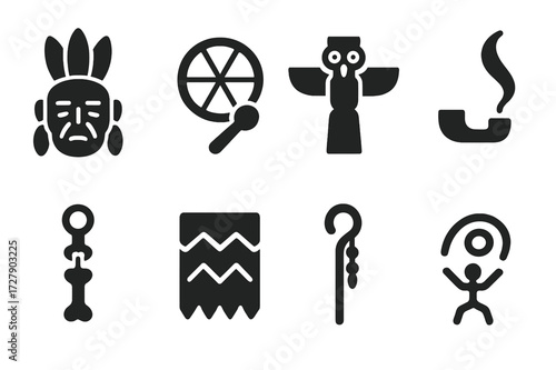 Shaman Icons Collection. Solid, filled icon set of shaman elder: feather headdress, ceremonial drum, spirit totem, smoke pipe, bone charm, ritual cloth, staff