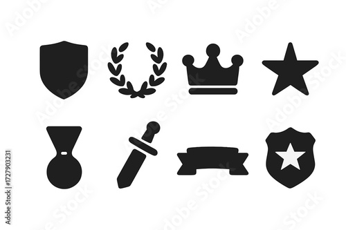 Honor Shields Icons. Solid, filled icon set of honor shields: heraldic shield, laurel wreath, crown, star, medal, sword, banner, badge. Solid, filled icons in