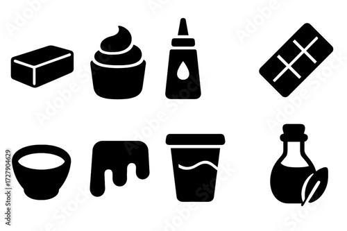 Black Cooking Icons. Solid, filled icon set of smooth cooking ingredients: butter, cream, sauce, chocolate, custard, caramel, yogurt, oil. Solid, filled icons