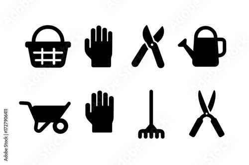 Garden Tool Icons. Solid, filled icon set of garden harvesting tools: basket, gloves, pruning shears, watering can, wheelbarrow, gloves, rake, garden scissors.