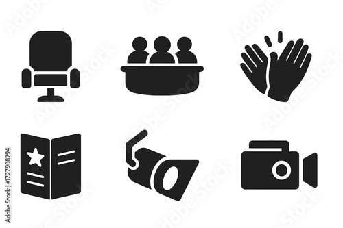 Theater Icon Set. Solid, filled icon set of stage audience elements: seat, balcony, ticket, applause hands, program booklet, spotlight, exit sign, camera.