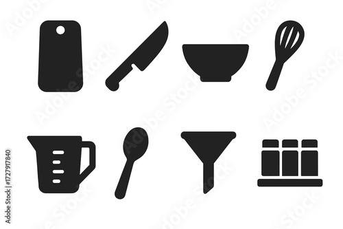 Kitchen Essentials Icons. Solid, filled icon set of seasoning kitchen essentials: cutting board, chef knife, mixing bowl, whisk, measuring cup, spoon, funnel,