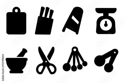 Kitchen Tool Icons. Solid, filled icon set of cutting and prep tools: chopping board, knife block, slicer, mandoline, food scale, mortar and pestle, kitchen