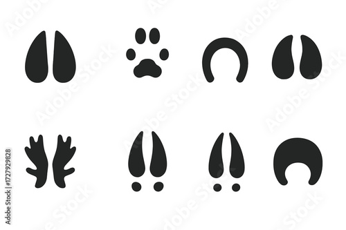 Herbivore Tracks Icons. Solid, filled icon set of herbivore tracks: deer hoof print, rabbit footprints, horse hoof print, cow hoof print, moose tracks, elk