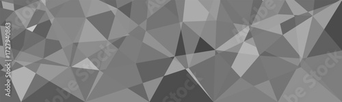 Abstract geometric background with gray polygonal shapes forming a modern low poly design.