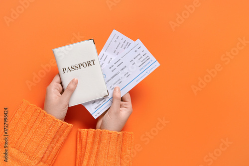 Female hands with passport ...