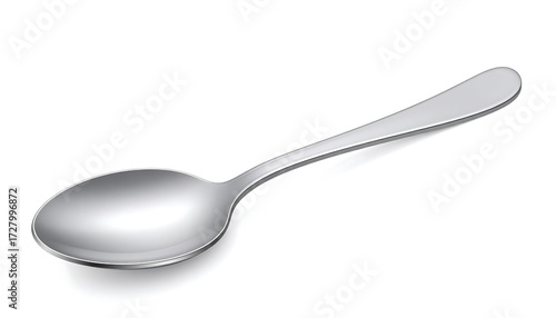 A silver spoon, angled, on a white background