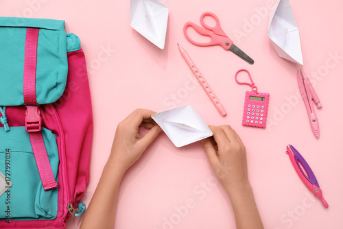 Child's hands with paper bo...