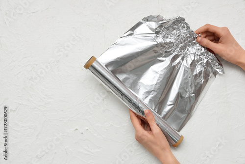 Female hands with aluminium...