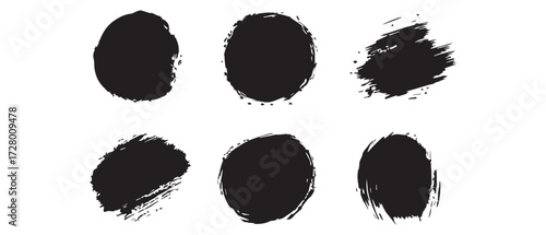 Six black ink blots display a variety of brushstroke textures on a white background