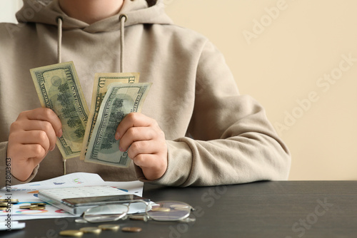 Woman with dollar banknotes...