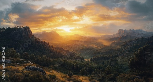 Sunset over sprawling forested mountains with dramatic cloudy sky casting warm golden light on the landscape