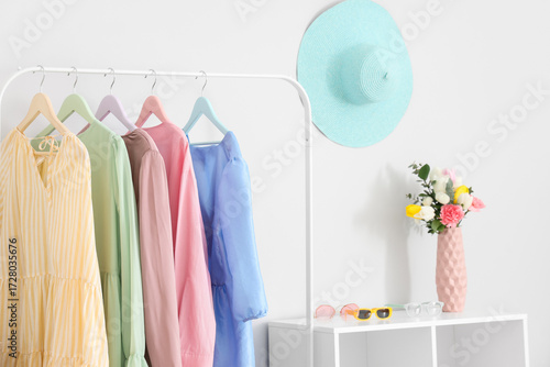Rack with stylish female cl...