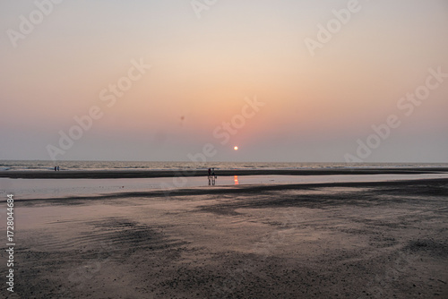 Peaceful Evening at Bangladesh’s Cox's Bazar with Sunset and Empty Beach.