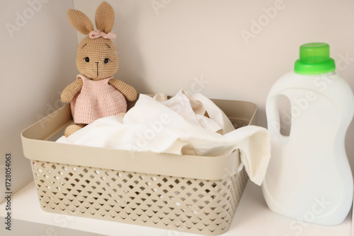 Laundry basket with toy bun...