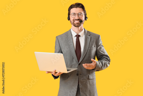 Male secretary in headset w...