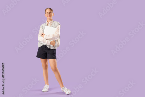 Female student with laptop ...