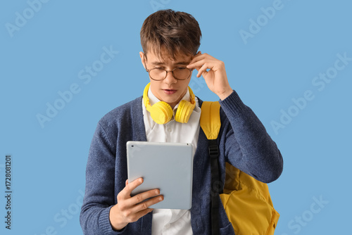 Shocked male student studyi...