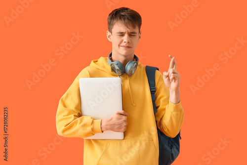 Male student with laptop cr...