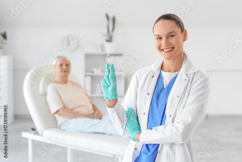 Female doctor with vaccine ...
