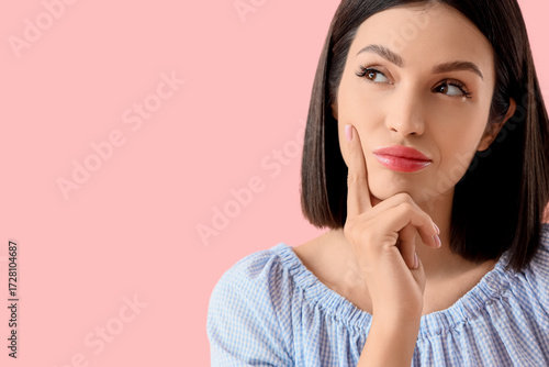 Thoughtful young woman on p...