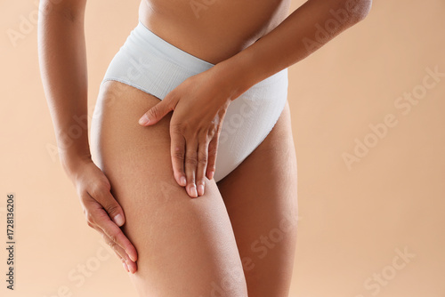 Young woman in underwear wi...