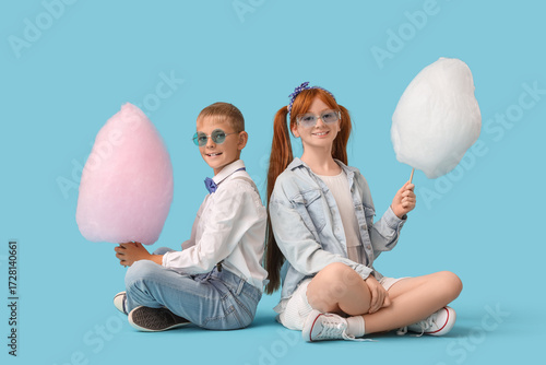 Teen girl and boy with cott...