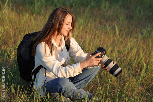 Young female photographer w...
