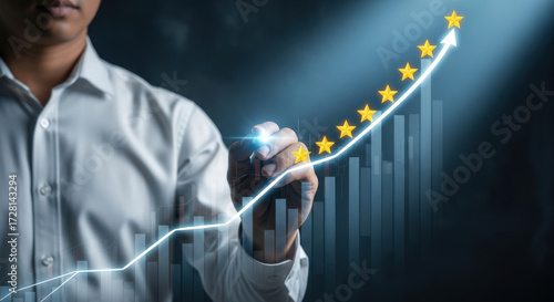 Businessman Drawing Upward Growth Chart with Stars.