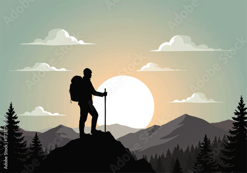 Silhouette of a hiker with a backpack and walking stick standing on a mountain peak, gazing at the sunset over a mountainous landscape with trees and clouds.