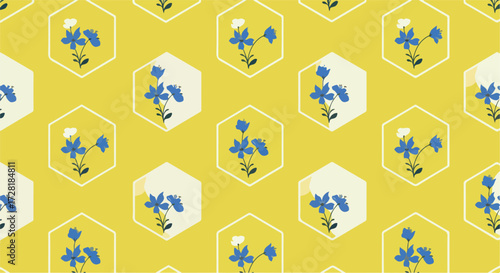 Floral pattern with blue flowers inside hexagonal shapes on yellow background.