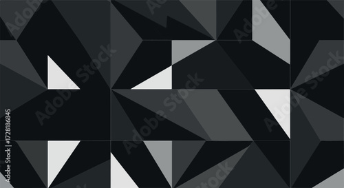 Geometric abstract design with triangles and various shades of gray.
