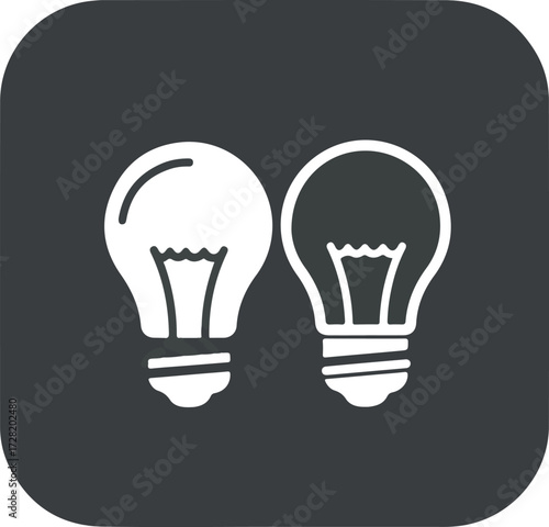 Two light bulbs representing ideas and innovation on a dark background.