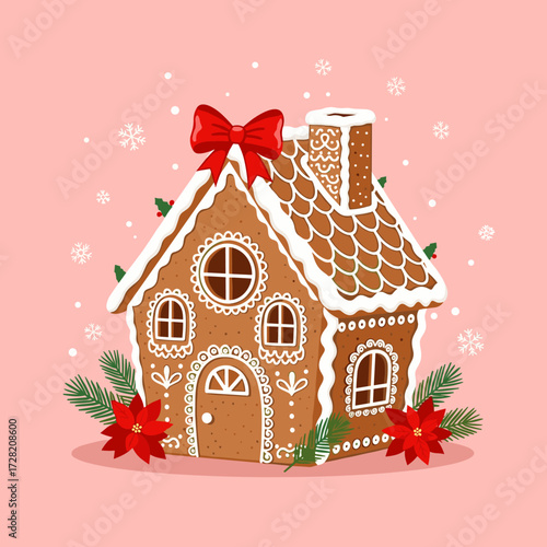 A charming festive gingerbread house decorated with icing and a red bow.