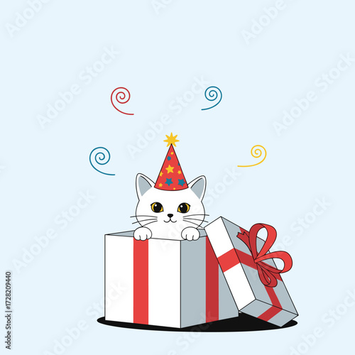 A cute kitten peeking out of a festive gift box wearing a birthday hat.