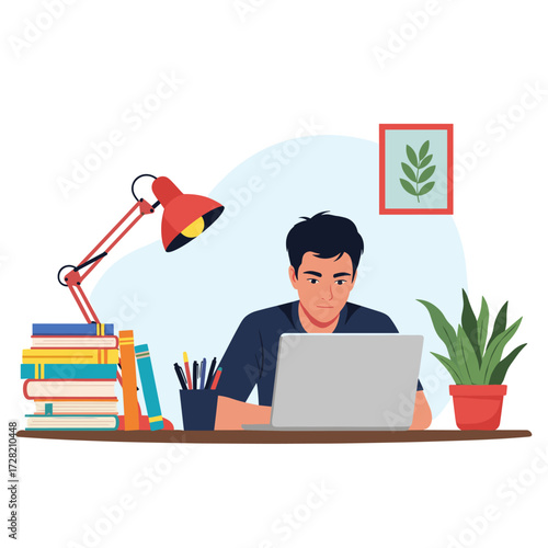 A young man diligently working on his laptop surrounded by books and study materials.