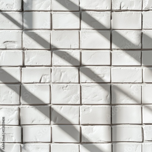 White brick wall with diagonal shadows (3)
