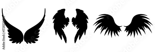 A striking black silhouette of a majestic eagle in flight wings spread wide isolated on a clean white background conveying freedom and power silhouette isolated on white background