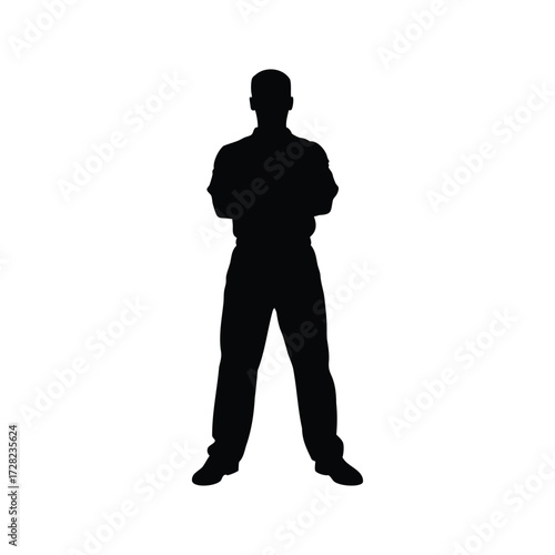 Silhouette of a confident man standing with arms crossed and looking forward, mechanic standing with arms crossed silhouette vector illustration