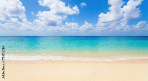 Wallpaper Mural Serene tropical beach landscape with turquoise water and fluffy white clouds in blue sky Torontodigital.ca