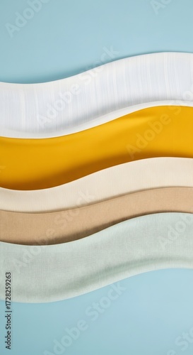 Abstract wavy layers of fabric in white yellow beige brown and light blue background design art