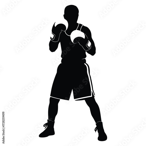 Silhouette of Boxer in Stance with Gloves Ready to Fight and Compete