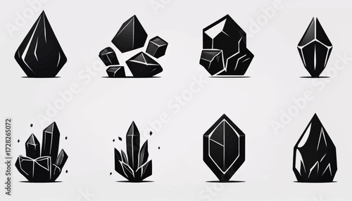 Various shapes of black, faceted crystals and gemstones illustrated in a minimalist graphic style.