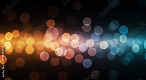 Colorful bokeh lights in abstract pattern on dark background  
