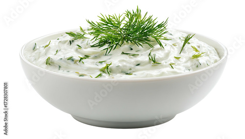 Creamy herb dip in a white bowl