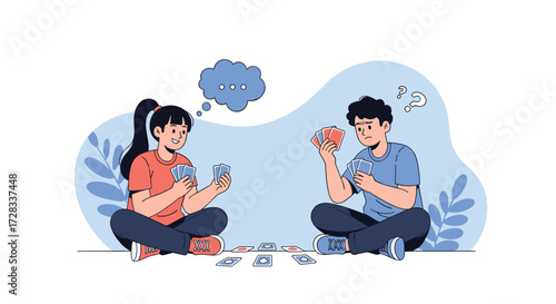 Two people playing cards sitting on the floor having fun.