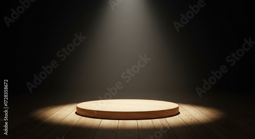 Spotlight illuminates a simple wooden stage on a polished wooden floor creating an elegant and dramatic scene perfect for product showcases or award ceremonies